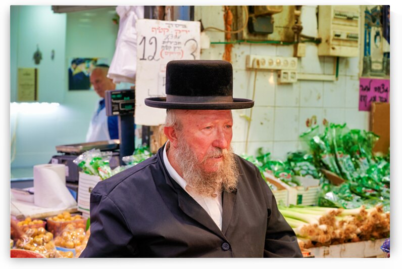 Elderly man in Mahane Yehuda Market in Jerusalem during a busy d by Marco Brivio