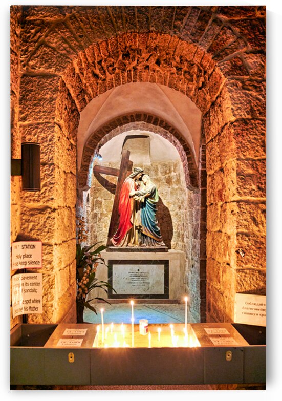 Statue of Mary and Jesus in a chapel with candles by Marco Brivio