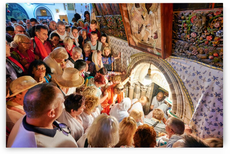 Crowd gathers at grotto of nativity in Bethlehem Israel by Marco Brivio
