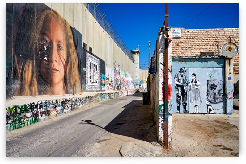 West Bank separation wall in Bethlehem shows murals and artwork by Marco Brivio
