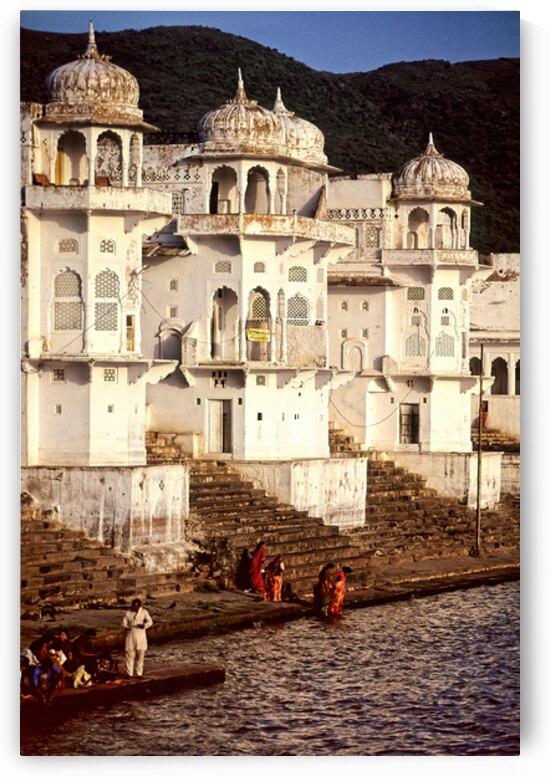 Pushkar Rajasthan near the lake with people and buildings in vie by Marco Brivio