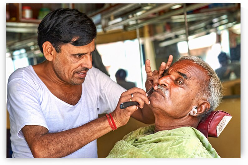 Barber cuts hair in Mandawa Shekawati Rajasthan by Marco Brivio
