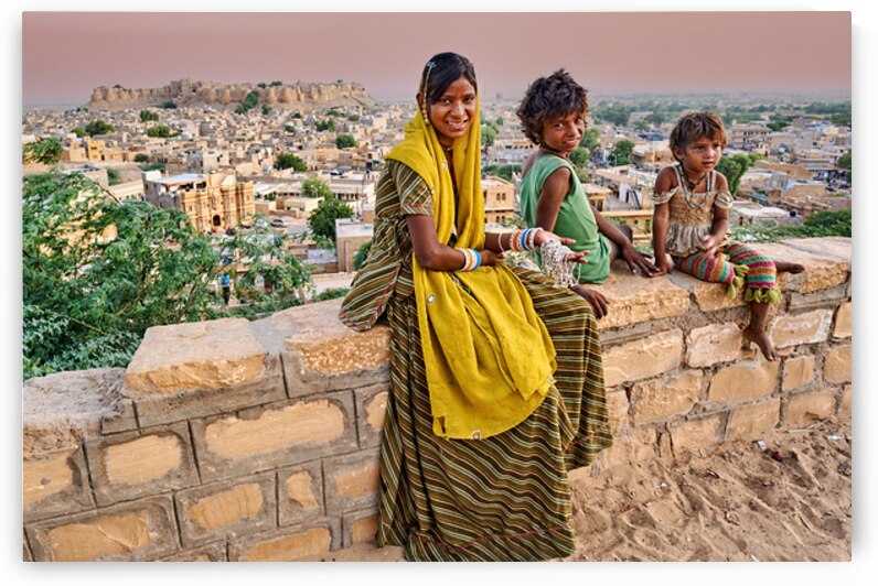 Group of children in Rajasthan Jaisalmer with city view by Marco Brivio