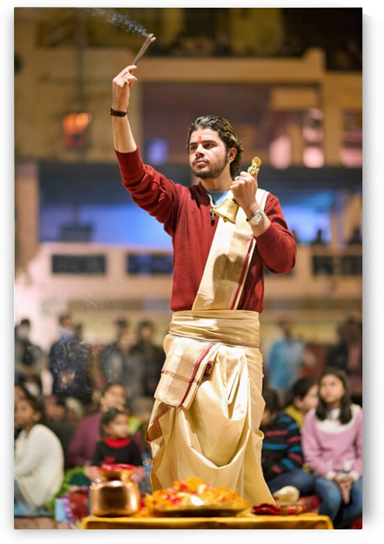 Hindu aarti ceremony at Ganges river in Varanasi during evening by Marco Brivio