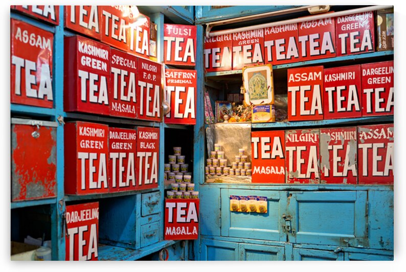 Varanasi tea stall with various tea types and colorful boxes by Marco Brivio