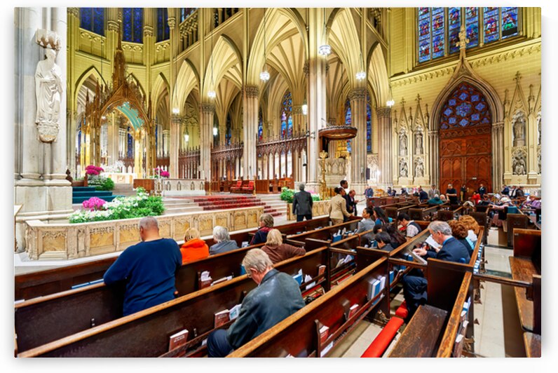 Faithful pray inside St. Patricks Cathedral in Manhattan New Y by Marco Brivio