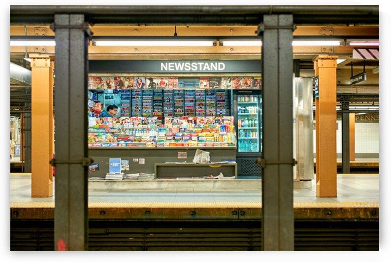 Newsagent yawning at newsstand in Manhattan subway station by Marco Brivio