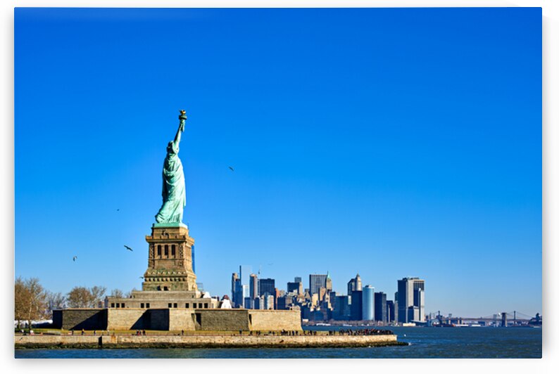 Statue of Liberty stands tall on Liberty Island in New York City by Marco Brivio