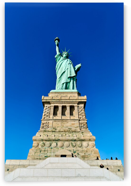 Statue of Liberty stands proudly on Liberty Island in Manhattan by Marco Brivio