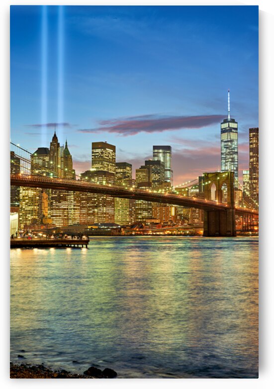 Tribute in Light shines over Manhattan skyline at dusk by Marco Brivio