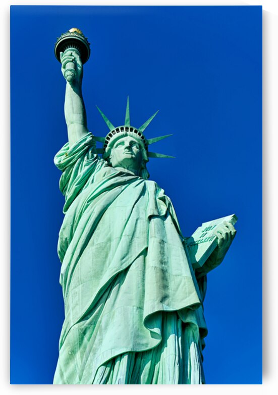 Statue of Liberty stands tall on Liberty Island in New York by Marco Brivio