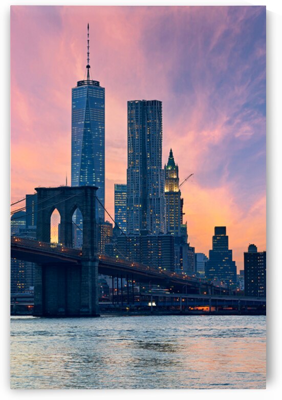 Brooklyn Bridge and Manhattan skyline during sunset in New York by Marco Brivio