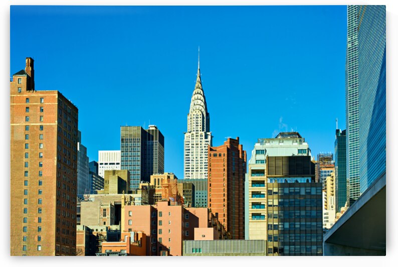 Chrysler Building stands tall among Manhattan buildings in New Y by Marco Brivio