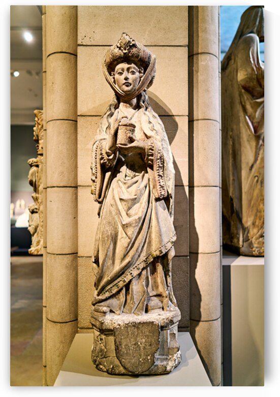 Sculpture of a woman holding a book in the Metropolitan Museum o by Marco Brivio