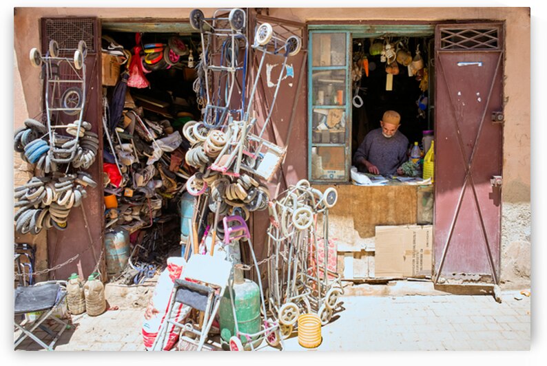 Second hand dealer working in Meknes Moroccos market street by Marco Brivio