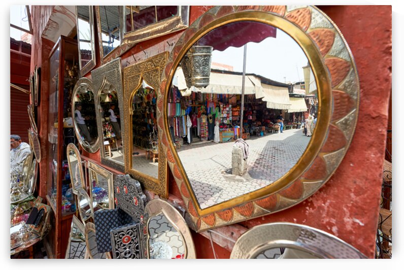 Life in the souk of Marrakesh showing local shops and items by Marco Brivio