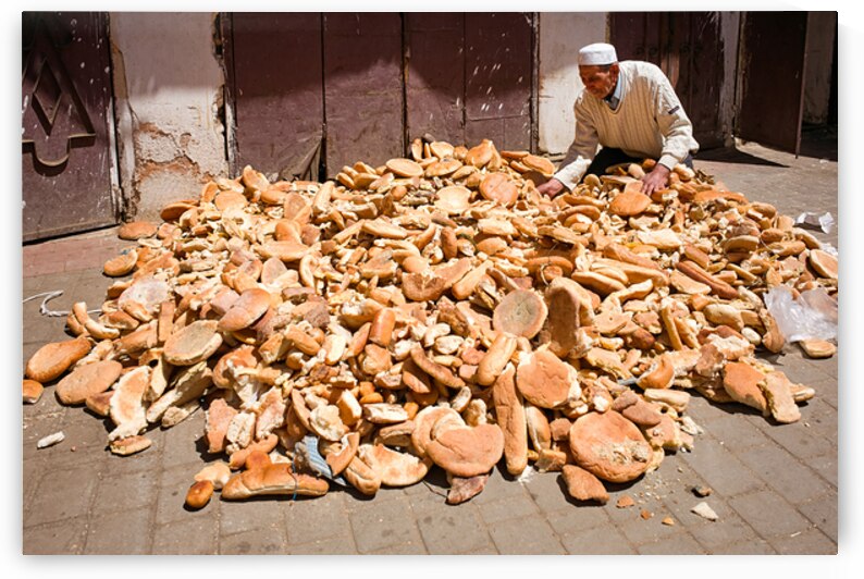 Collecting bread in Meknes Morocco during the day by Marco Brivio