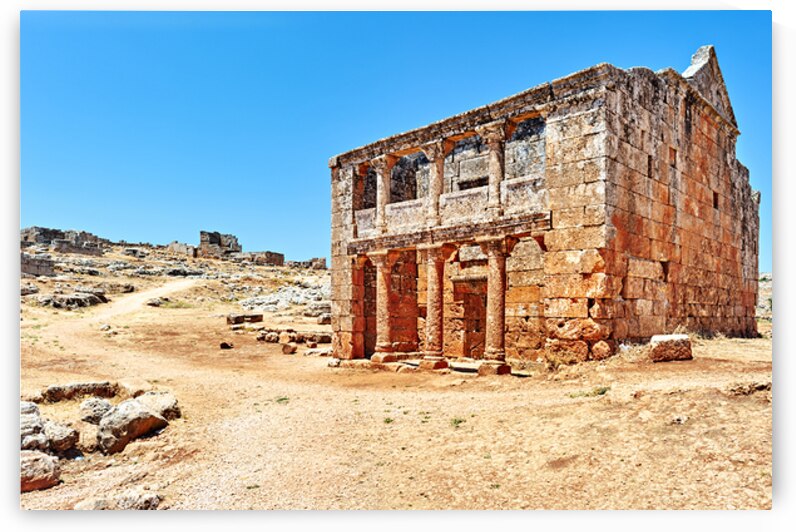 Exploring historic ruins in Serjilla Syria on a clear day by Marco Brivio