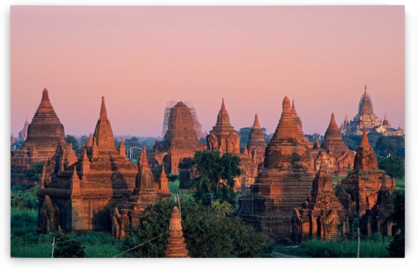 Temples in Bagan at dusk with a clear sky over Myanmar by Marco Brivio