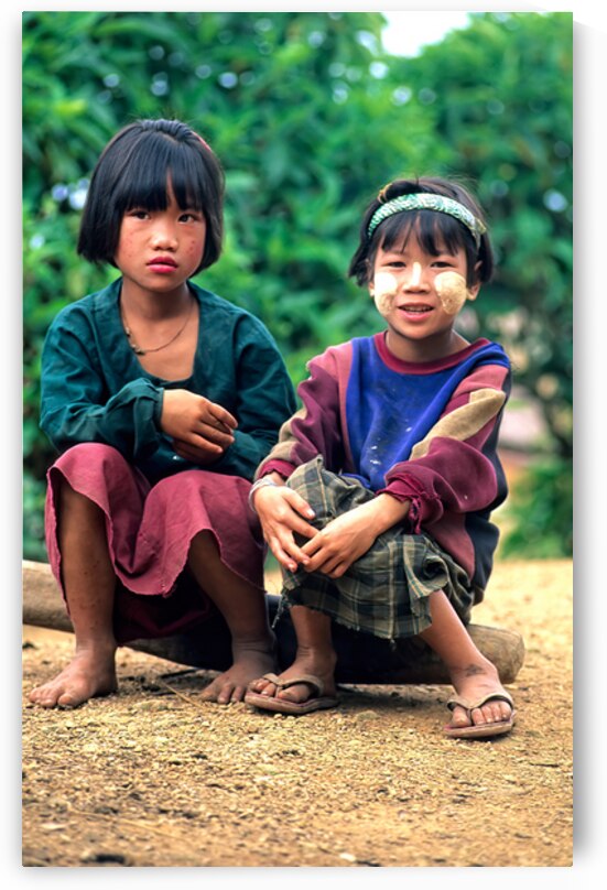 Portrait of children in Myanmar taken on a sunny day by Marco Brivio
