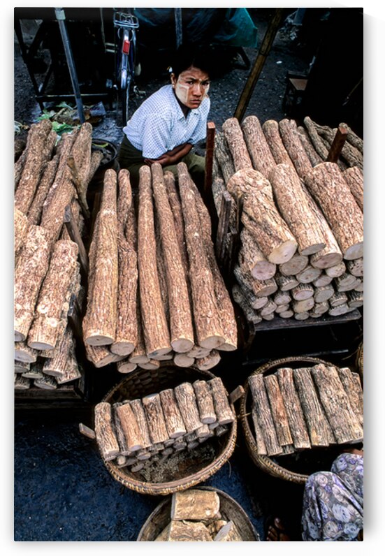 Market activity in Yangon featuring wood seller and products by Marco Brivio