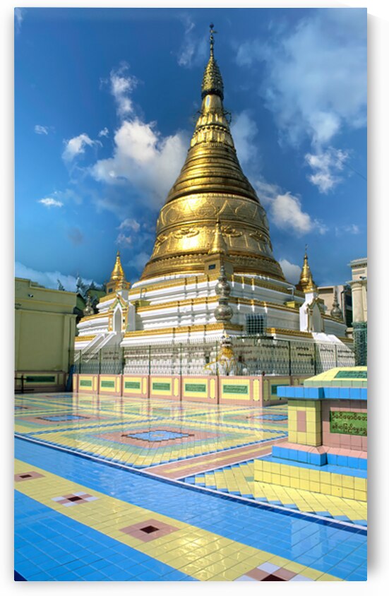 Golden stupa at Sagaing Paya in Myanmar under blue sky by Marco Brivio
