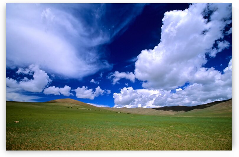 Vast sky over empty landscape in Mongolia during daytime by Marco Brivio