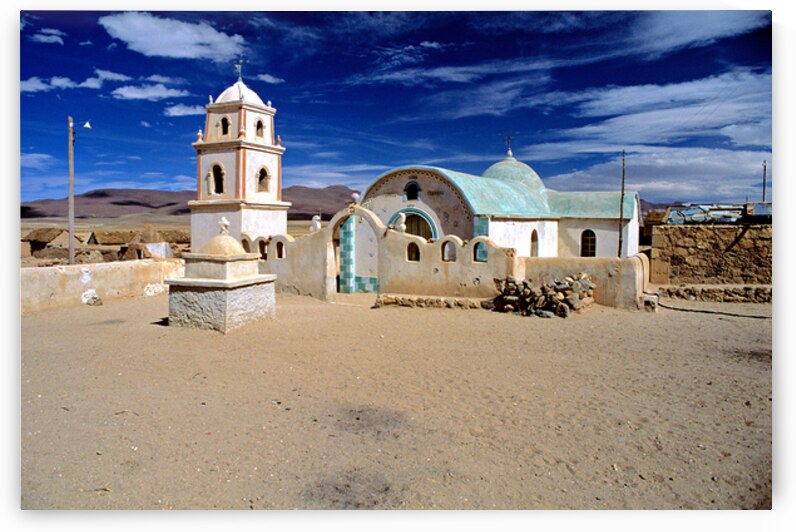Remote desert church with bell tower under a dramatic sky. by Marco Brivio
