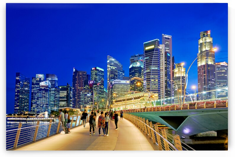 City skyline and people walking at sunset near Marina Bay by Marco Brivio