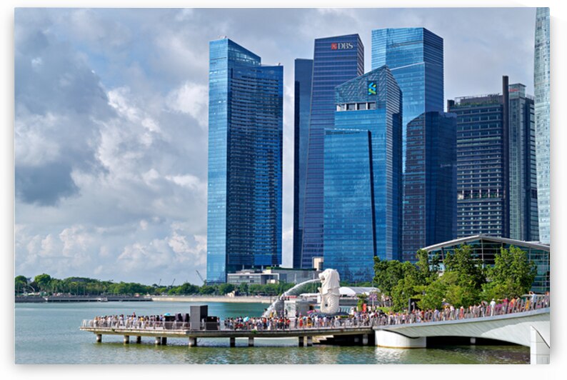 People are walking near a bridge in Singapores financial distri by Marco Brivio