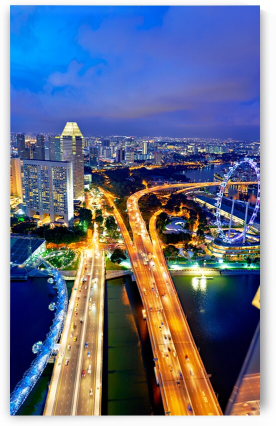 City lights shine in Marina Bay as sunset brings night activity by Marco Brivio