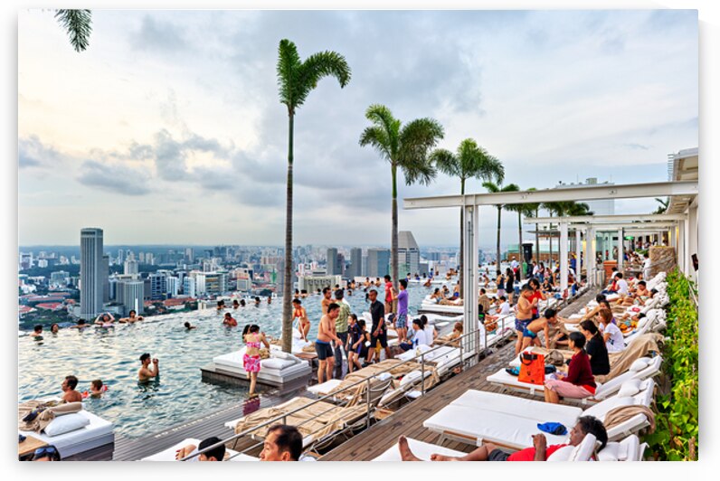 Visitors enjoy swimming in the infinity pool at Marina Bay Sands by Marco Brivio
