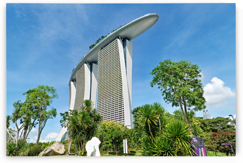 Marina Bay Sands Hotel stands tall in Singapore with clear blue  by Marco Brivio