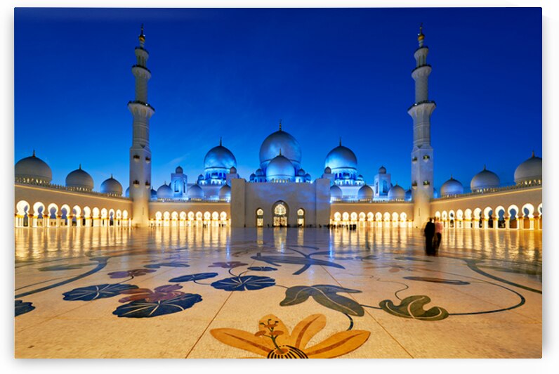 Visitors admire the beauty of Sheikh Zayed Grand Mosque at night by Marco Brivio