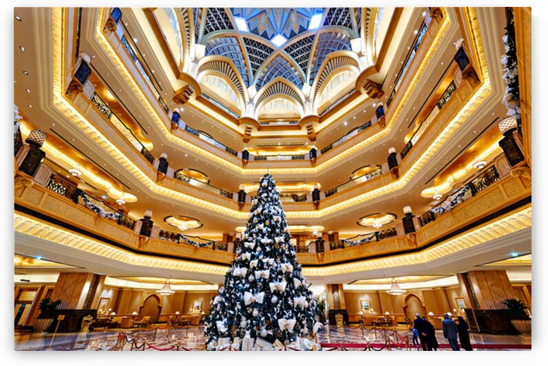 People walk around the Emirates Palace Hotel lobby in Abu Dhabi by Marco Brivio