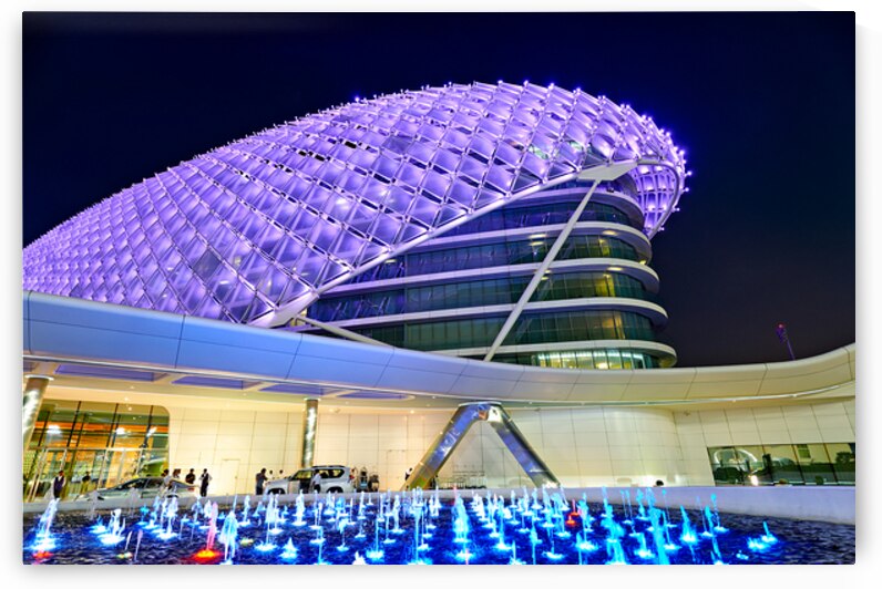 Visitors explore the W Abu Dhabi Yas Island hotel at night by Marco Brivio