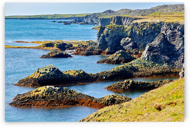 Exploring Arnarstapi cliffs in Iceland by the ocean by Marco Brivio