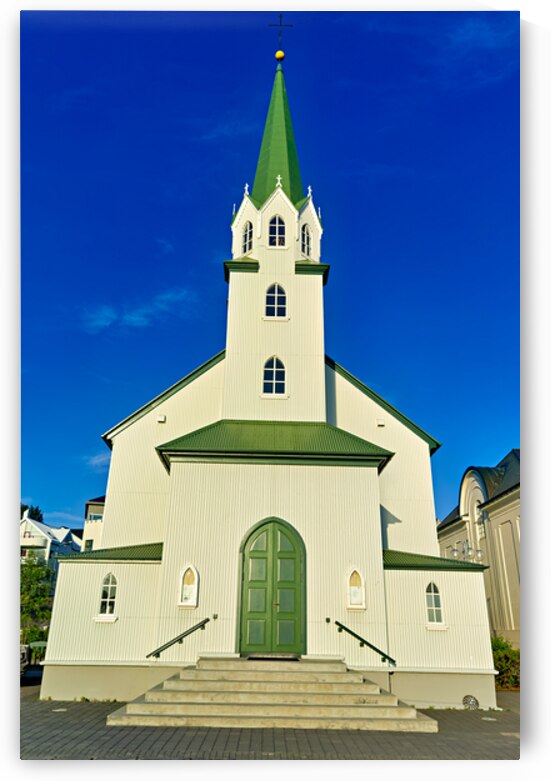 Lutheran Free Church in Reykjavik Iceland during sunset by Marco Brivio