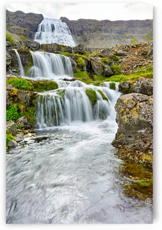 Gongumannafoss waterfall in Iceland with flowing water by Marco Brivio