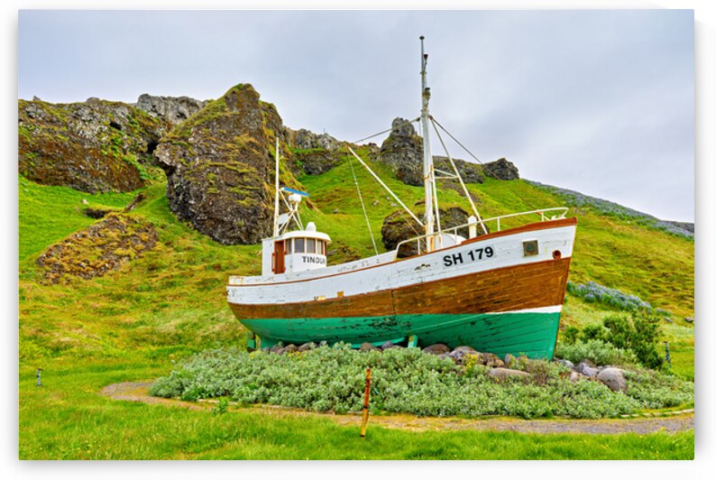 Fishing boat near Olafsvik in Iceland on a cloudy day by Marco Brivio