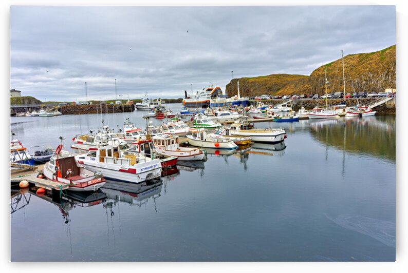 Fishing boats docked in Stykkisholmur harbor in Iceland by Marco Brivio