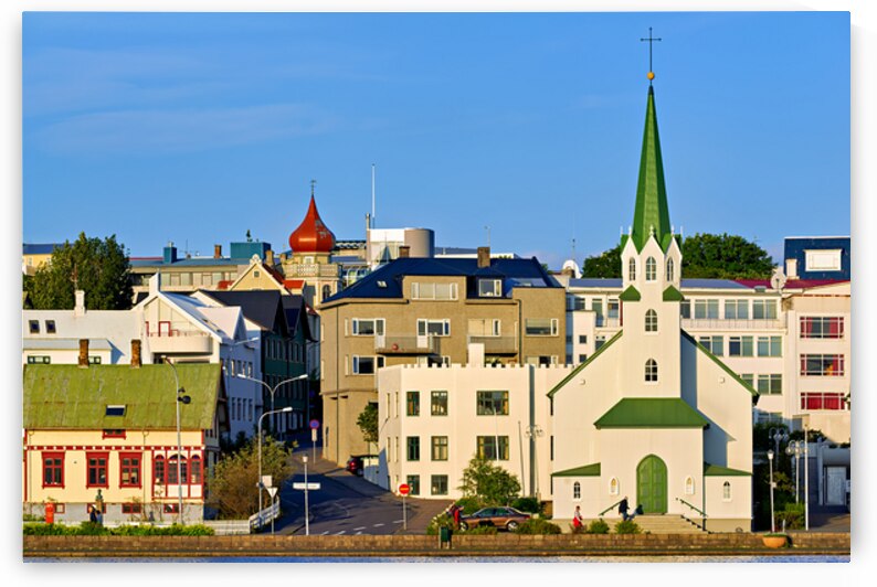Lutheran free church in reykjavik by lake tjornin by Marco Brivio