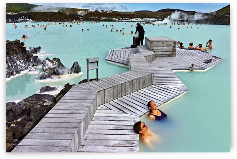 Visitors enjoy the thermal water at Blue Lagoon Spa in Iceland by Marco Brivio