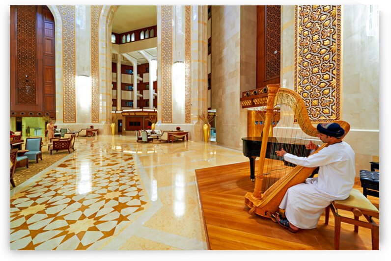 Muscat Oman Al Bustan hotel lobby with musician playing harp by Marco Brivio