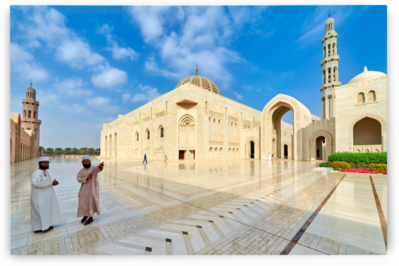Visitors explore Sultan Qaboos Grand Mosque in Muscat Oman by Marco Brivio