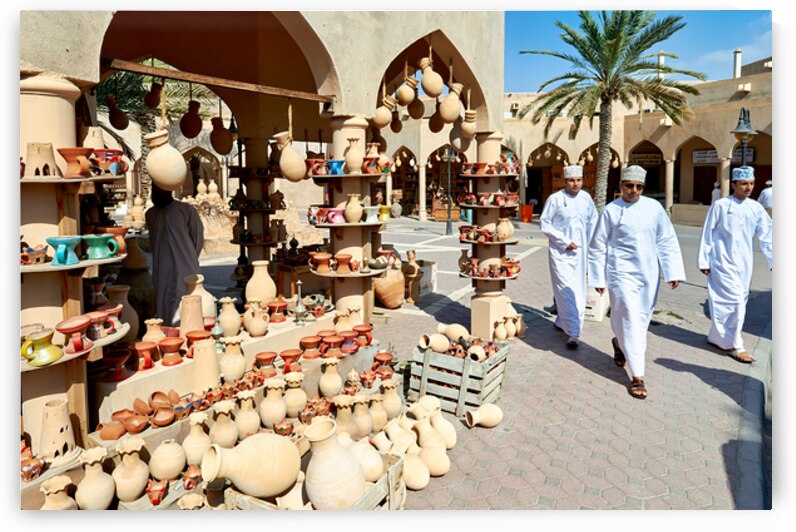Visitors explore the market at Nizwa Oman during the day by Marco Brivio