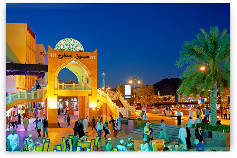 Waterfront view of Mutrah Souq in Muscat at sunset time by Marco Brivio