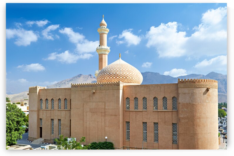 Nizwa Fort view with mountains and clouds in Oman by Marco Brivio