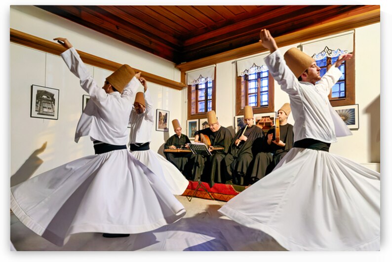 Whirling dervishes perform in Istanbul during sufi ceremony by Marco Brivio