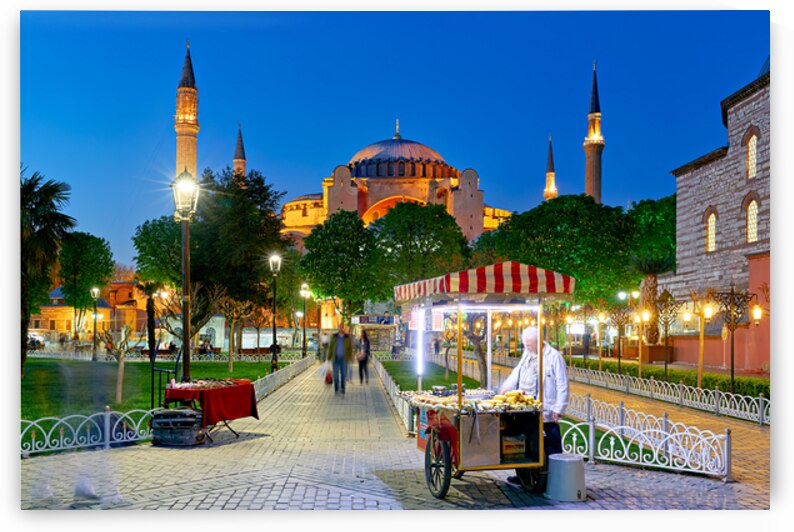 Hagia Sophia Grand Mosque at night with local vendor by Marco Brivio